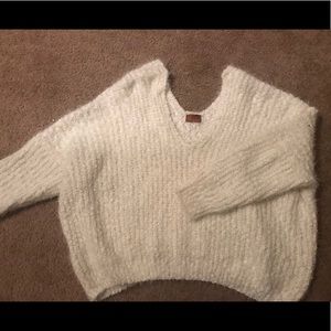 White fuzzy sweater
